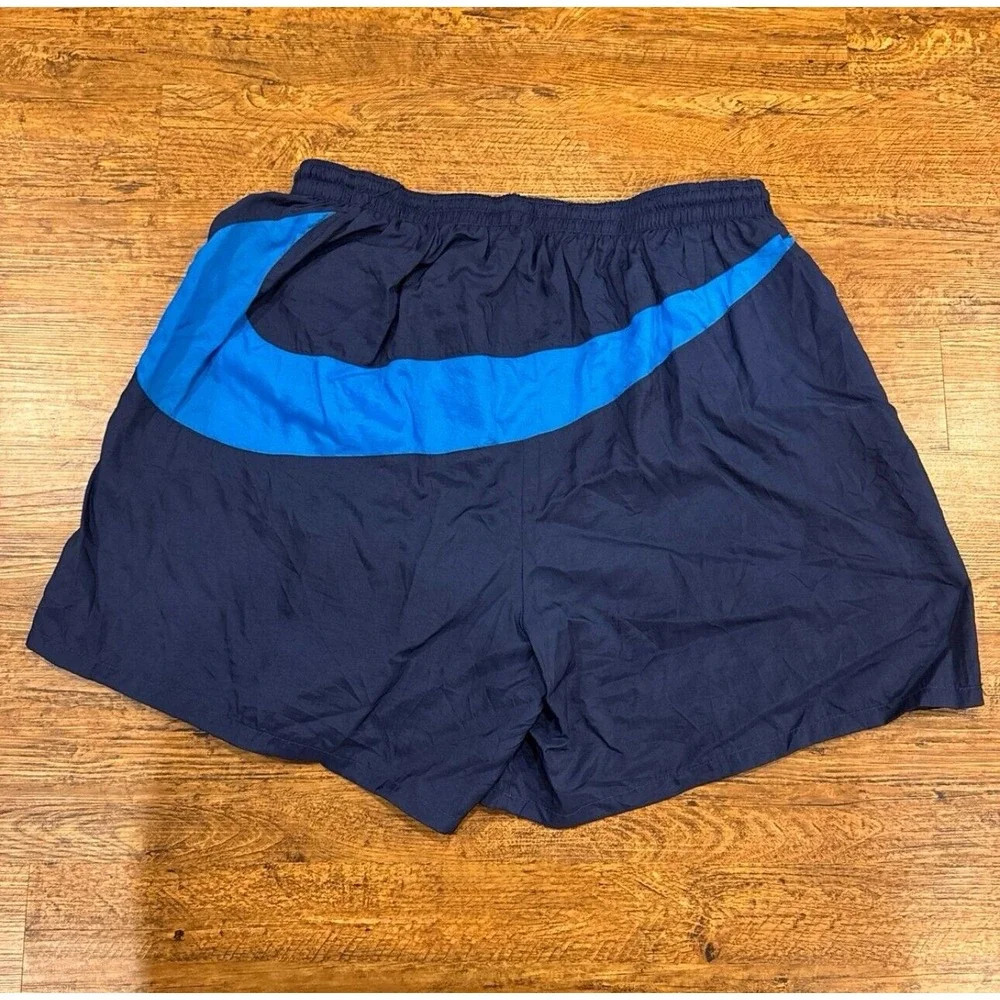 Vintage 90's Nike Blue Big Swoosh Casual Vacation Swim Shorts Trunk 5.5